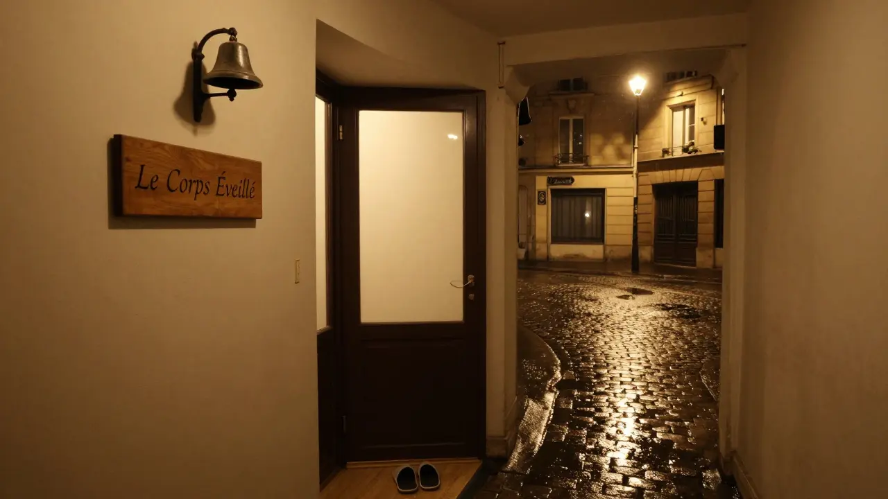 A quiet Parisian wellness studio entrance with a wooden sign and slippers, evoking privacy and calm.